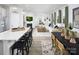 Open-concept layout, kitchen island extends to living room, creating a cozy and connected space at 7200 Hodges Meadow Ln, Charlotte, NC 28213
