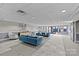 Open lobby area featuring contemporary furnishings, neutral decor, and large windows with natural light at 721 Governor Morrison St # 408, Charlotte, NC 28211