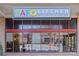 Restaurant front with colorful signage and large windows offering Mediterranean street food at 721 Governor Morrison St # 408, Charlotte, NC 28211