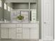 Bathroom features double sinks, vanity with neutral cabinets and drawers, and a shower with a glass door at 8418 Norman Forest Rd, Lancaster, SC 29720