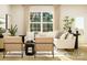 Cozy living room with modern furniture, natural light, and a comfortable seating arrangement at 8418 Norman Forest Rd, Lancaster, SC 29720