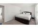 Spacious bedroom with a bed and a nightstand at 10337 Hugue Way, Charlotte, NC 28214