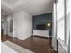Bright bedroom features a large window and a modern dresser at 1037 Naples Dr, Davidson, NC 28036