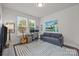 Comfortable home office with natural light, stylish decor, and a functional workspace at 1037 Naples Dr, Davidson, NC 28036