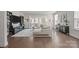 Spacious living room with hardwood floors, large windows, and modern furnishings at 1037 Naples Dr, Davidson, NC 28036