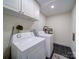 Convenient laundry room with modern appliances, including a washer and dryer, for easy laundry care at 10514 Lorelei Pl, Charlotte, NC 28227