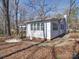 The back of the house has a wooden deck and porch at 10514 Lorelei Pl, Charlotte, NC 28227