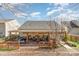 Rear exterior of the home with a spacious covered deck perfect for outdoor living at 10722 Mountain Springs Dr, Charlotte, NC 28278