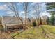 A view of the backyard from an elevated position, showing the deck and covered patio at 10722 Mountain Springs Dr, Charlotte, NC 28278