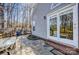 Stone patio area with outdoor furniture at 11010 Pale Hickory Ln, Charlotte, NC 28215