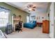 Bedroom featuring vaulted ceiling, ceiling fan, and desk area at 11010 Pale Hickory Ln, Charlotte, NC 28215