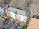 Aerial view of the apartment building, parking lot and landscaping at 1162 W 1St St, Charlotte, NC 28202