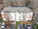 Aerial view of the apartment complex and the parking lot at 1162 W 1St St, Charlotte, NC 28202