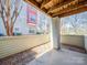 Private outdoor patio with a wood ceiling and privacy fence at 1162 W 1St St, Charlotte, NC 28202
