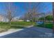 Well-maintained backyard with a swing and storage shed at 12012 Stainsby Ln, Charlotte, NC 28273