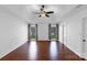 Bedroom with hardwood floors, neutral walls, and windows to the landscaped yard at 12012 Stainsby Ln, Charlotte, NC 28273