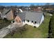 Charming single-story home with brick and white siding, complemented by a cozy front porch at 12012 Stainsby Ln, Charlotte, NC 28273