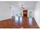 Bright and open living area with hardwood floors, a cozy fireplace, and ample space at 12012 Stainsby Ln, Charlotte, NC 28273
