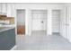 Spacious pantry and laundry area offering plentiful storage and organization options at 12012 Stainsby Ln, Charlotte, NC 28273