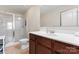 Bathroom featuring a glass shower, vanity with a sink and a toilet at 1205 Skywatch Ln, Monroe, NC 28112