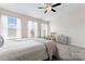 Bright bedroom with a large window, a soft carpet, and a neutral color scheme at 1205 Skywatch Ln, Monroe, NC 28112
