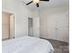 Bedroom featuring ceiling fan, carpet, and white doors and trim at 1205 Skywatch Ln, Monroe, NC 28112