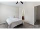 Bedroom features a twin bed, neutral walls, and a doorway into the bathroom at 1205 Skywatch Ln, Monroe, NC 28112