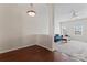 Bright living room showcasing hardwood floors and an open layout to the living area at 1205 Skywatch Ln, Monroe, NC 28112