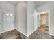 Hallway featuring a front door, neutral paint, and unique tile flooring at 125 Rocky Trail Ct, Fort Mill, SC 29715