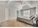 Spacious main bedroom featuring a vaulted ceiling, ceiling fan, carpet, and a large window at 125 Rocky Trail Ct, Fort Mill, SC 29715