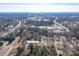 Aerial view of the neighborhood with tree coverage and Winthrop University in the background at 142 Westerwood Dr, Rock Hill, SC 29732