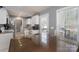 Bright dining area with table, stainless steel appliances, and a door leading to the deck at 142 Westerwood Dr, Rock Hill, SC 29732