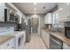Functional kitchen featuring stainless steel appliances, tile flooring, and ample counter space at 142 Westerwood Dr, Rock Hill, SC 29732