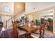 Formal dining room with a large table and access to other rooms at 148 Painted Bunting Dr, Troutman, NC 28166
