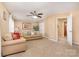 Open living room with neutral colors, and two sofas at 148 Painted Bunting Dr, Troutman, NC 28166