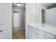 Bathroom with tiled floors, a modern vanity, and a connecting door to another room with a shower and bathtub at 15307 Country Lake Dr, Pineville, NC 28134