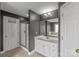 Modern bathroom featuring a glass enclosed shower, tiled floors, and a white vanity with marble countertop at 1919 46Th Avenue Ne Dr # 46, Hickory, NC 28601