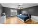 Bedroom with hardwood floors, a view to the outside, and modern furniture at 1919 46Th Avenue Ne Dr # 46, Hickory, NC 28601