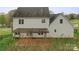 Rear view of home featuring a patio with pergola and backyard at 1919 46Th Avenue Ne Dr # 46, Hickory, NC 28601