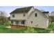 Rear view of home featuring a patio with pergola and backyard at 1919 46Th Avenue Ne Dr # 46, Hickory, NC 28601
