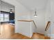 Upstairs hallway with hardwood floors and views into the bedroom at 1919 46Th Avenue Ne Dr # 46, Hickory, NC 28601