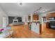 The living room features an open floor plan, hardwood floors, and a fireplace at 1919 46Th Avenue Ne Dr # 46, Hickory, NC 28601