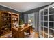 The beautiful office features hardwood floors, a built-in bookshelf, and a rustic wooden desk at 1919 46Th Avenue Ne Dr # 46, Hickory, NC 28601
