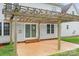 Inviting outdoor patio with a pergola, seating, and well-maintained lawn at 1919 46Th Avenue Ne Dr # 46, Hickory, NC 28601