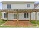 Back patio featuring a pergola, sliding glass door, and view of the backyard at 1919 46Th Avenue Ne Dr # 46, Hickory, NC 28601