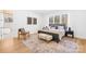 Modern bedroom with large window and natural light, decorative rug, and ensuite bathroom at 2010 Bessbrook Rd, Fort Mill, SC 29708