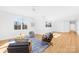 Spacious bonus room with hardwood floors, seating, and a large window at 2010 Bessbrook Rd, Fort Mill, SC 29708
