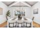 Dining area with elegant lighting and a window view, creating a perfect ambiance at 2010 Bessbrook Rd, Fort Mill, SC 29708