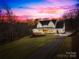 A charming two-story home with a well-manicured lawn at 2010 Bessbrook Rd, Fort Mill, SC 29708