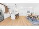 Open-concept kitchen featuring stainless steel appliances, an island, and a dining area at 2010 Bessbrook Rd, Fort Mill, SC 29708